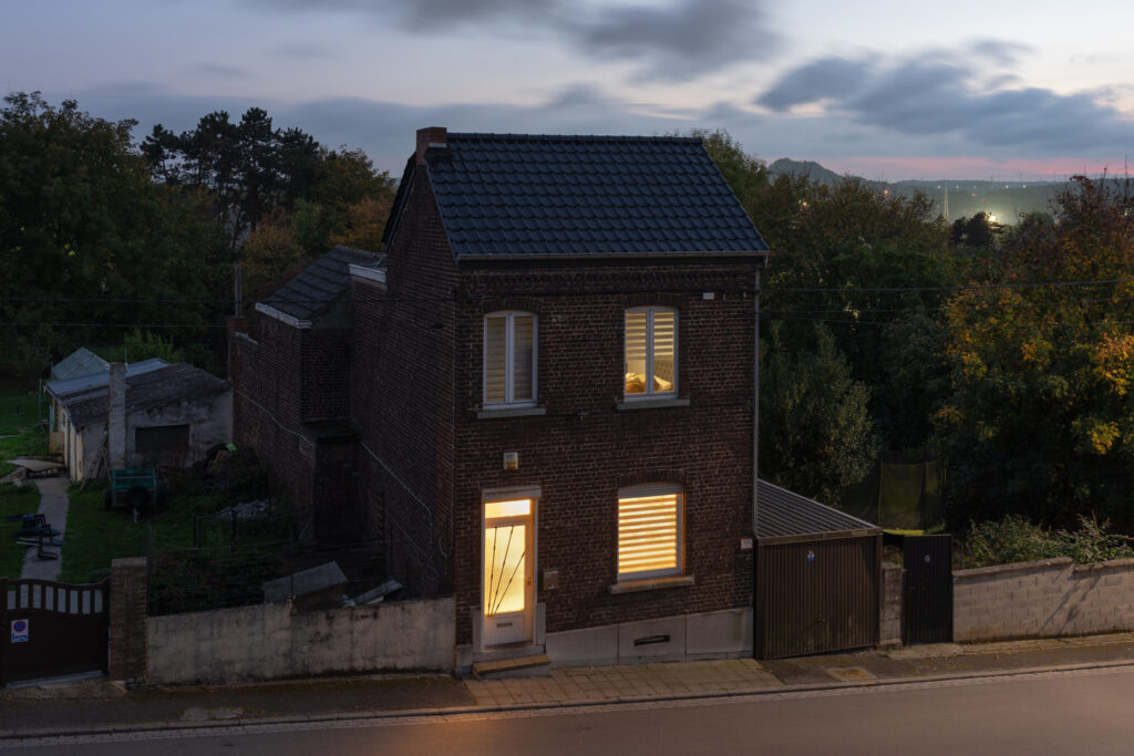 A row house at dusk.