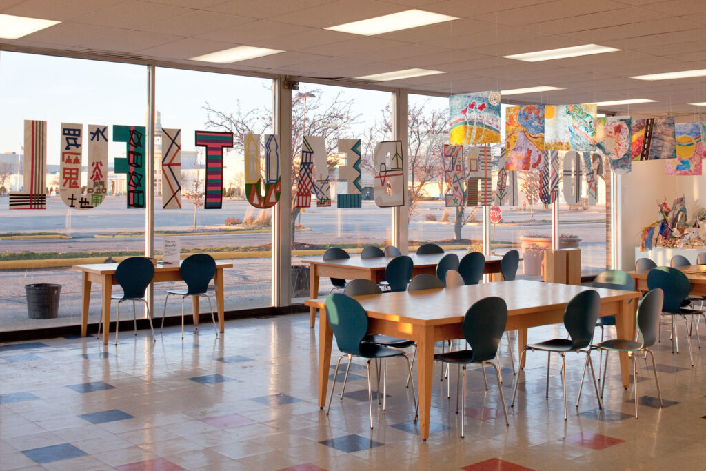Big Car's Lafayette Square Mall location in 2012, a light-filled room with the words "You are beautiful" written across the windows.